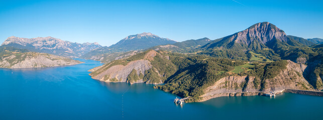 Aerial photography by drone of the Serre-Ponçon lake and its mountains, located in the...