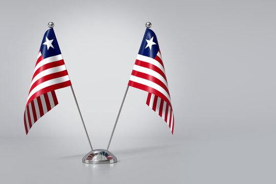 Double Republic of Liberia Table Flag on Gray Background. 3d Rendering