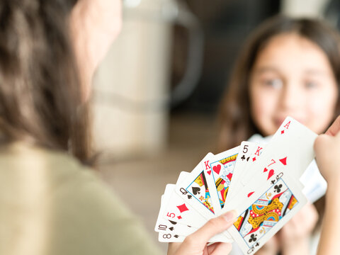 girl playing with cards	
