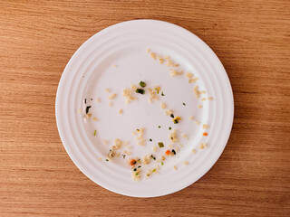 Empty plate of egg fried rice