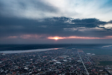 Majestic Danube Sunset: Aerial View of Romania's City by the River