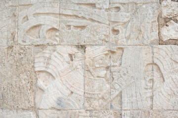 hieroglyphic inscriptions carved on the walls of the religion building in Chichen-Itza