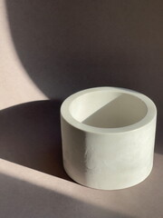 plaster penzle organizer cup. dark pastel tone with shadows. side view