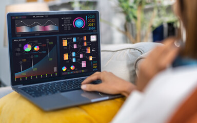Human work on laptop display data visualizations, screen with charts, graphs, market analysis,...