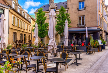 Old street with old houses and tables of cafe in a small town Chartres, France - 745824455