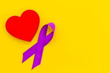 Purple ribbon with heart for world pancreas cancer day. Mental health Day