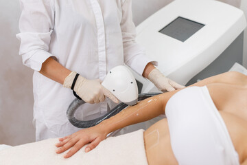 Laser epilation and cosmetology in beauty salon. Hair removal procedure. Laser epilation,...