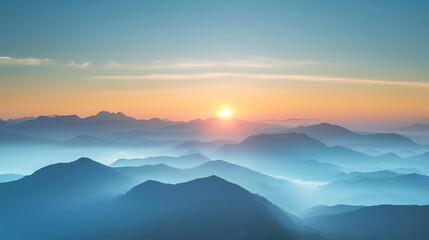Sunrise over a mountain range with misty valleys. Copy Space