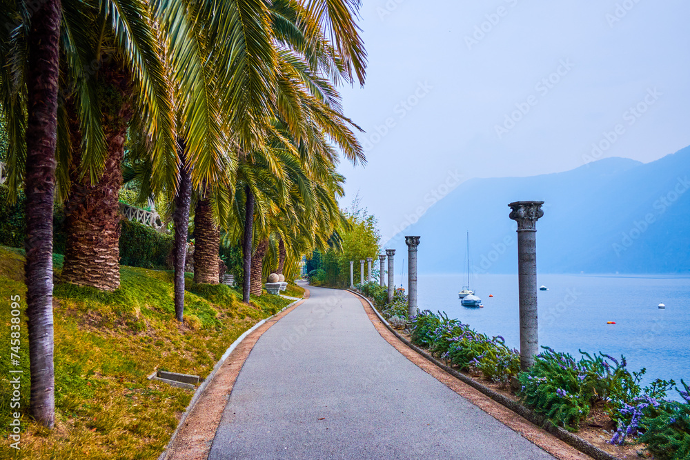 Wall mural The lakeside path in Park Villa Heleneum, Lugano, Switzerland