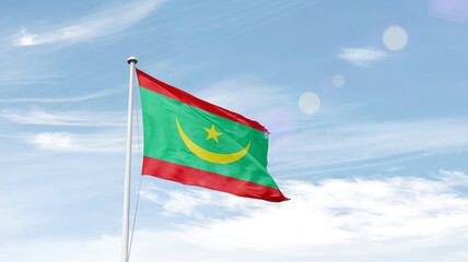Mauritania national flag cloth fabric waving on the sky.