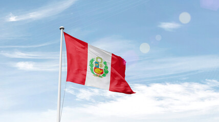 Peru national flag cloth fabric waving on the sky.