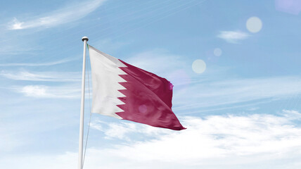 Qatar national flag cloth fabric waving on the sky.