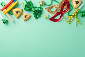 Purim feast concept captured from top view, featuring triangle cookies, star decorations,...