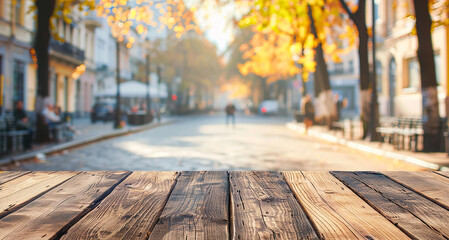 Naklejka na ściany i meble Wooden empty table blurred city street , wooden podium for product outside