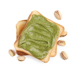 Foto op Plexiglas Toasts with tasty pistachio cream and nuts isolated on white, top view © New Africa
