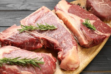 Pieces of raw beef meat on table, closeup