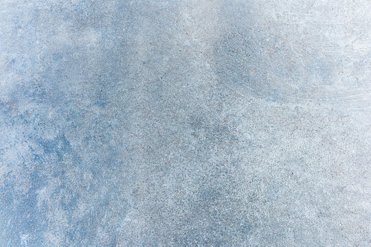 Winter Frost Texture A vibrant blue snow background with a grunge pattern, showcasing the beauty of snowflakes and the chilly essence of the winter season