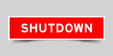 Square sticker label with word shutdown in red color on gray background