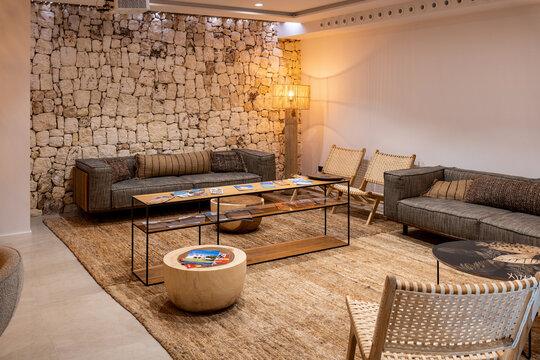 Empty living room with a warm atmosphere in a rustic hotel. Tourism concept