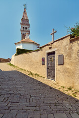 Tower in Piran city, Slovenia, cross