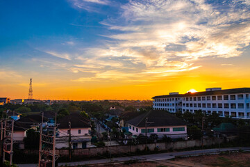 Beautiful golden colorful sunrise over the city panorama Pattaya Thailand.
