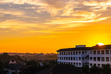 Beautiful golden colorful sunrise over the city panorama Pattaya Thailand. - obrazy, fototapety, plakaty