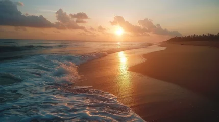 Fotobehang Golden Sands and Sea Waves. A Serene Sunset Scene on the Sandy Beach. As the Sun Dips Below the Horizon, the Ocean's Waves Dance Gently upon the Shoreline © Thares2020
