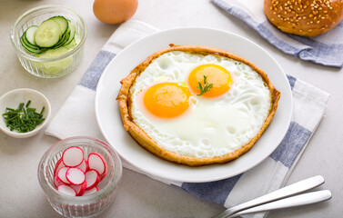Fried eggs with healthy additions - 745894854