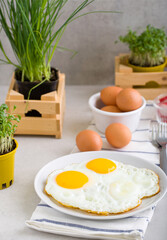 Fried eggs with healthy additions - 745895473