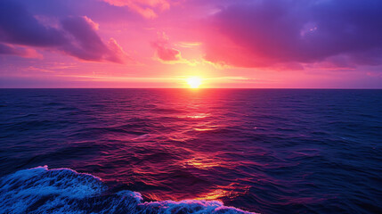 A dramatic sunset over the ocean with deep purples.