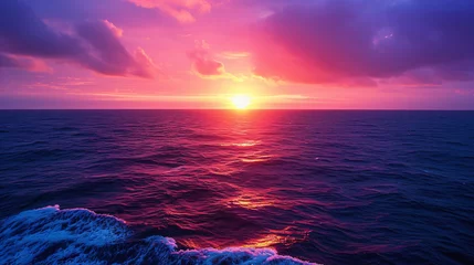 Keuken spatwand met foto A dramatic sunset over the ocean with deep purples. © Anthony