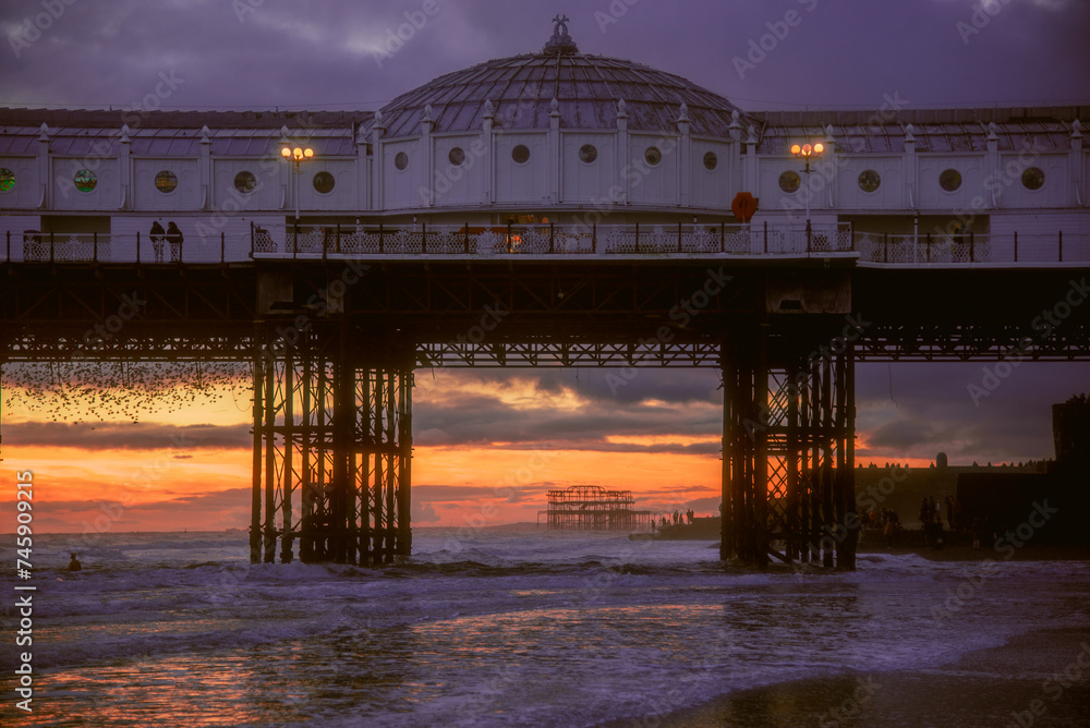 Wall mural Brighton with the two piers at sunset.  - Wall murals