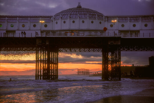 Brighton with the two piers at sunset. 