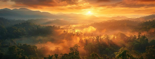 Fotobehang Majestic Mountain Sunrise: Ablaze Sky Casting Radiant Glow Over Dense, Mist-Enveloped Forest © Landscape Planet