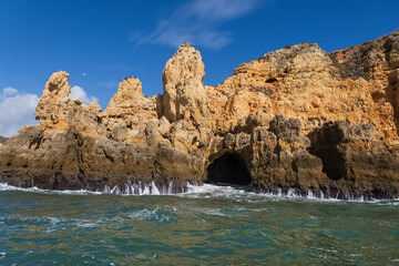 Algarve Coastline With Cave From The Atlantic Ocean In Lagos, Portugal - 745919030