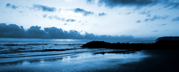 Deserted sandy beach in the morning on the Adriatic Sea under cloudless sky