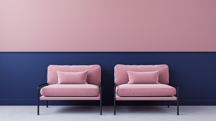 A modern interior design featuring two stylish pink armchairs with black metal frames. The background has a two-tone wall, with a soft pink upper section and a deep navy blue lower section