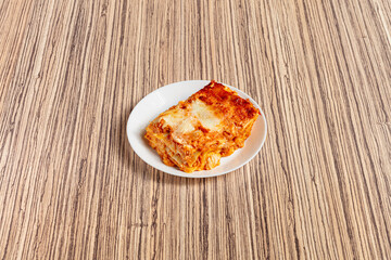 lasagna, strati, mozzarella, formaggio, ragù, pasta, italia, salsa, pomodoro, cucinare, roma, ristorante, casa, tavola calda, caldo, inverno, venature, texture, mamma, nonna, famiglia, tradizione, ita