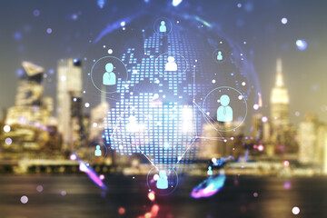 Virtual social network media hologram and world map on blurry skyscrapers background. Double...