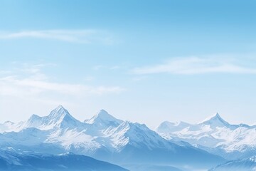 a snowy mountain tops and blue sky