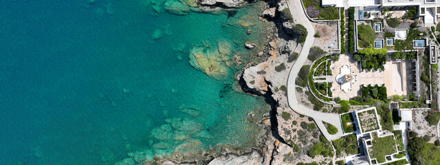 Aerial drone ultra wide photo of paradise secluded beach and bay of Agios Vasileios located in long peninsula of small island of Schoinousa, Small Cyclades, Greece - obrazy, fototapety, plakaty