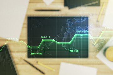 Abstract creative stats data concept and modern digital tablet on background, top view. Multiexposure