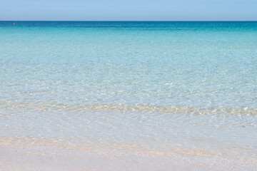 Fototapeta na wymiar Transparent seawater at the sand beach in Udo Island