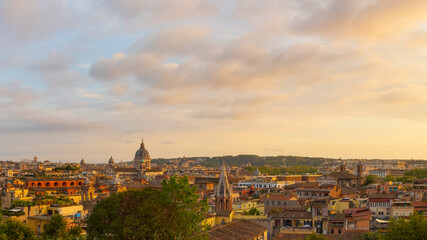 Fototapeta na wymiar Second Panorama of the cityscape of Rome, Italy, during a colorful sunset