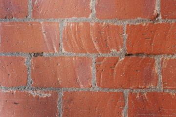 Fragment of a brick wall close-up.