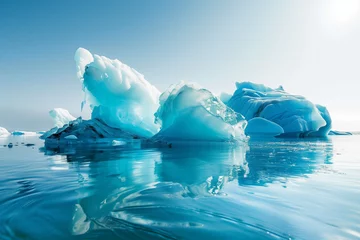  Massive Icebergs on Jokulsarlon lagoon in Iceland under clear white sky © The Picture House
