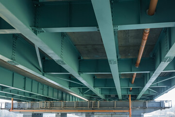 steel frame and concrete construction huge car bridge across the wide river