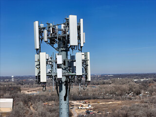Cell phone antenna array mounted on top of a monopole tower