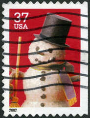 USA - 2002: shows Snowman with Pipe, devoted Christmas, 2002