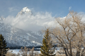 The Grand Teton poking through the clouds; Grand Teton NP; Wyoming